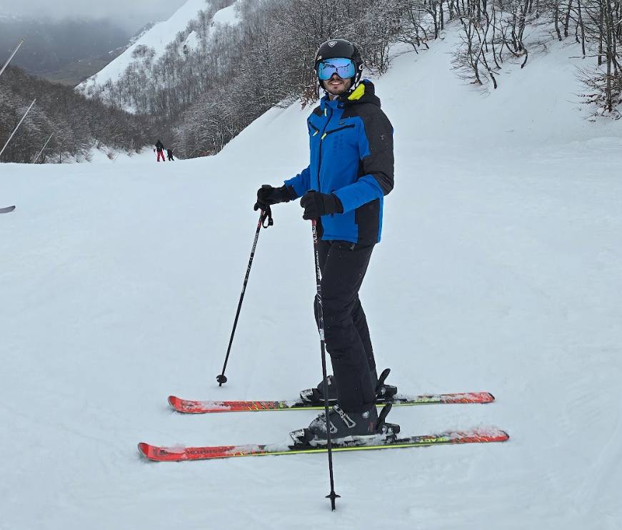 Alessandro skiing in the Italian mountains