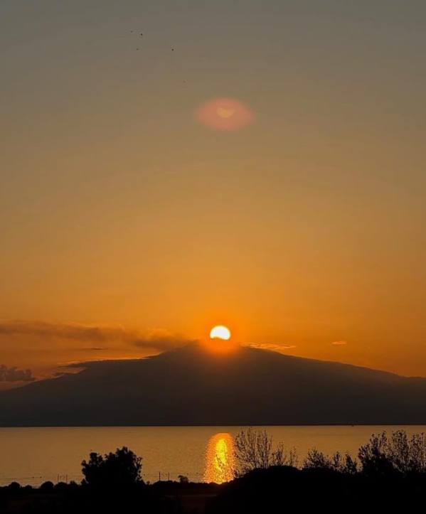 First light over the coast of Calabria, where Macro Mornings is written